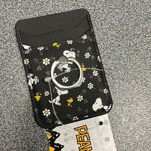 Peanuts Snoopy card holder…sticks to back of cell phone